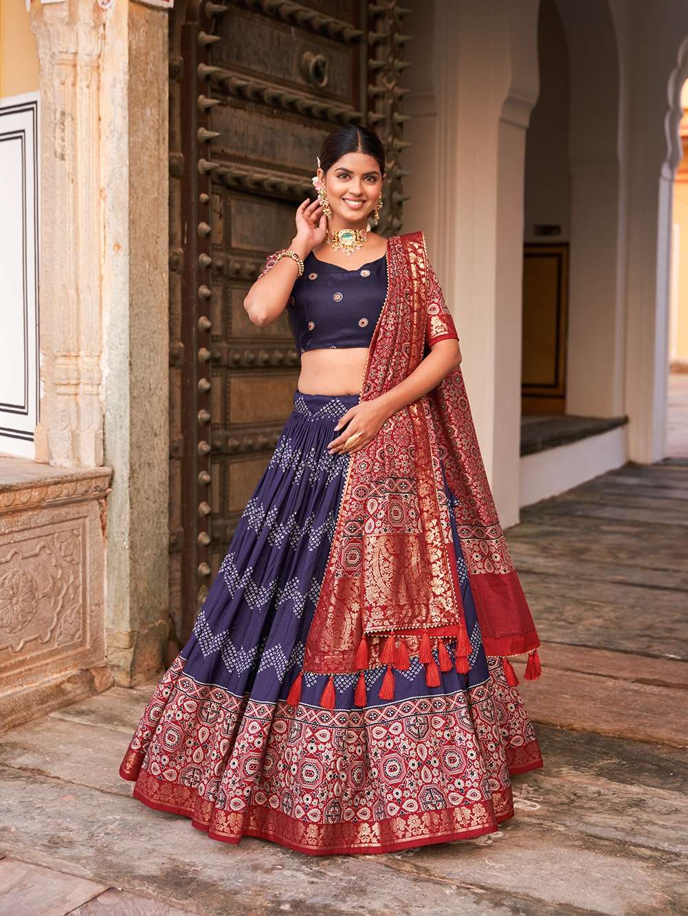  In the embrace of Tusser silk adorned with Ajarakh prints the lehenga 