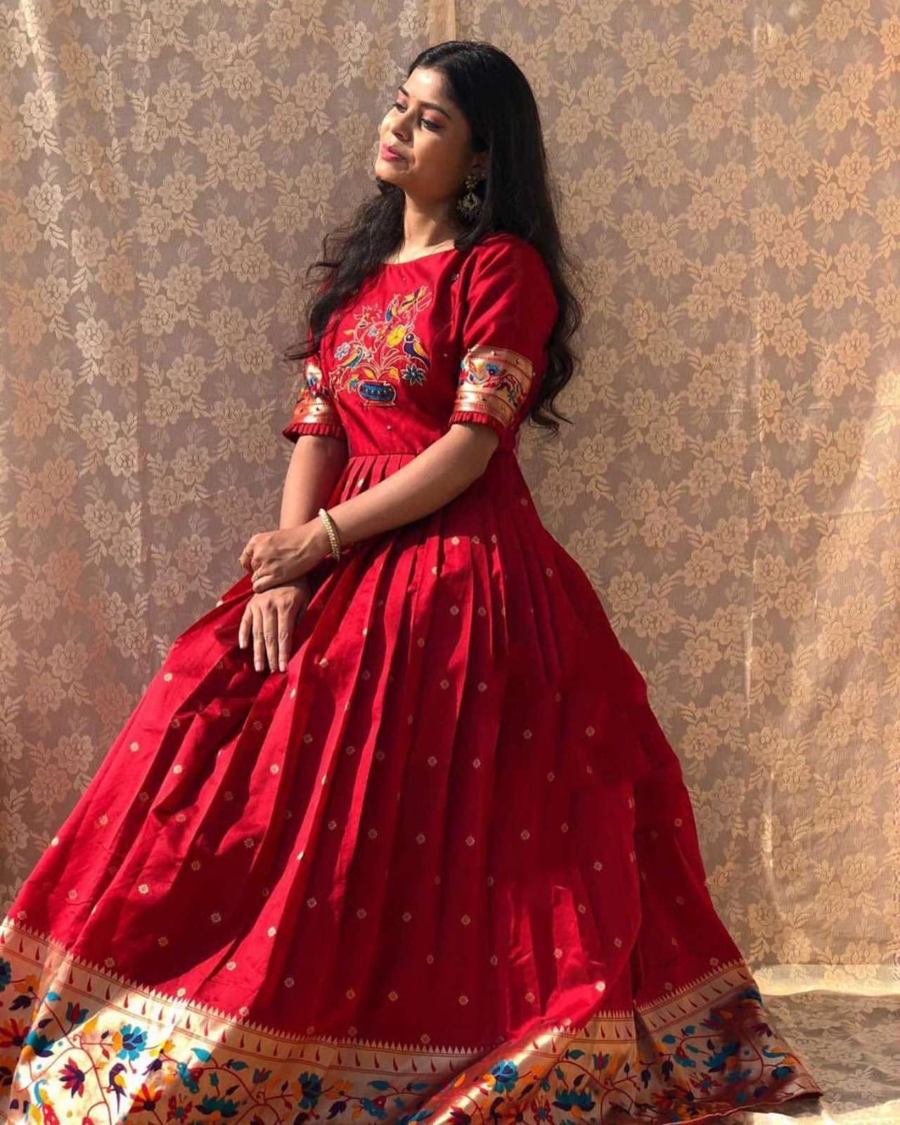 YNF5302RED jacquard silk Paithani dress embodies timeless elegance