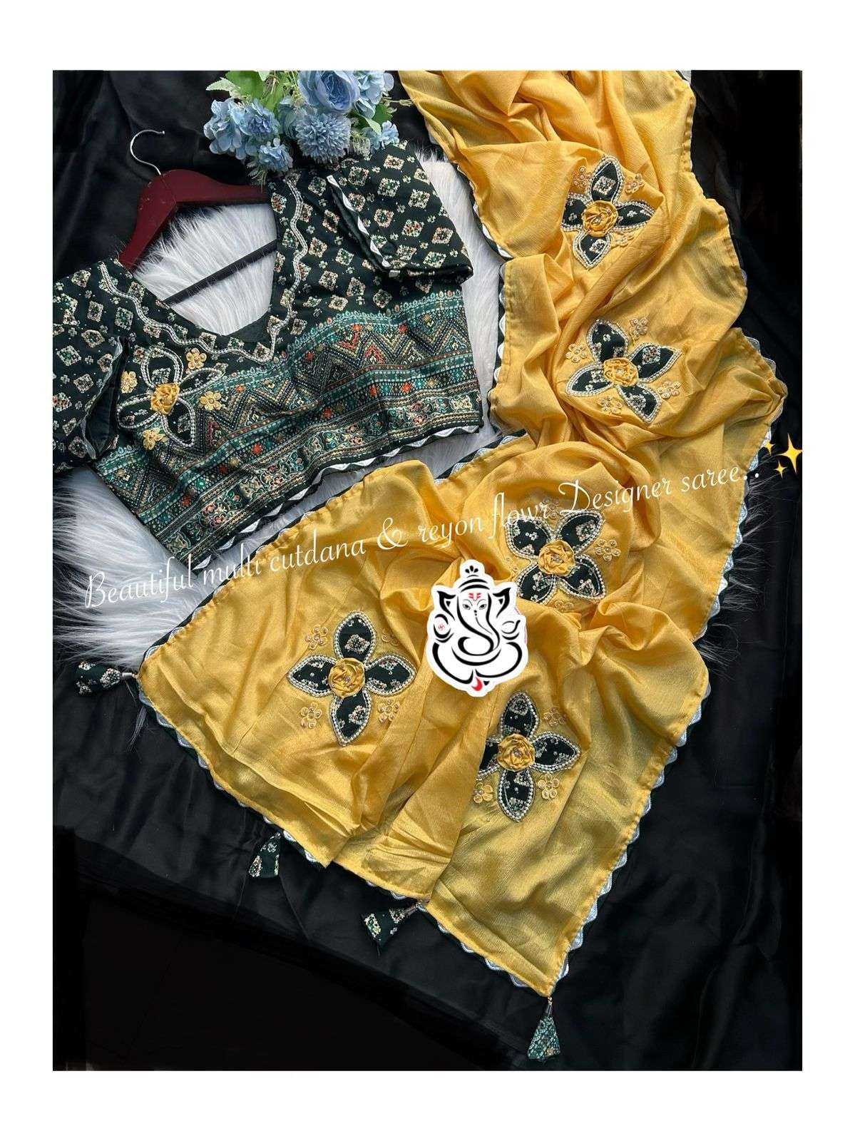 Beautiful mutli cutdana moti & daymond reyon flower butta Designer saree 