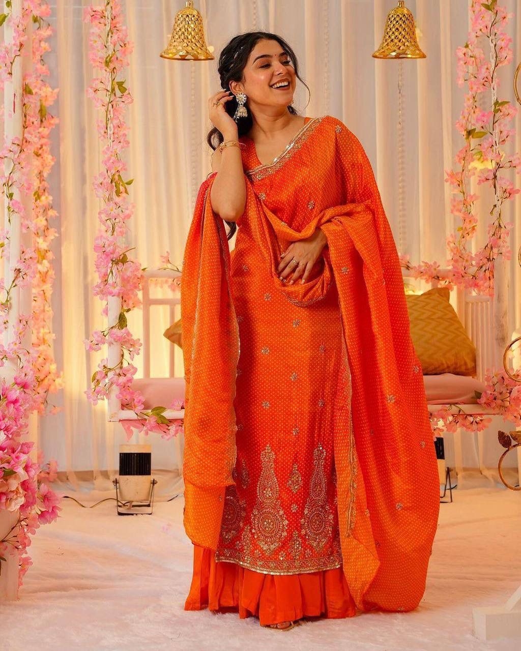 Launching a stunning green bandhej print straight suit