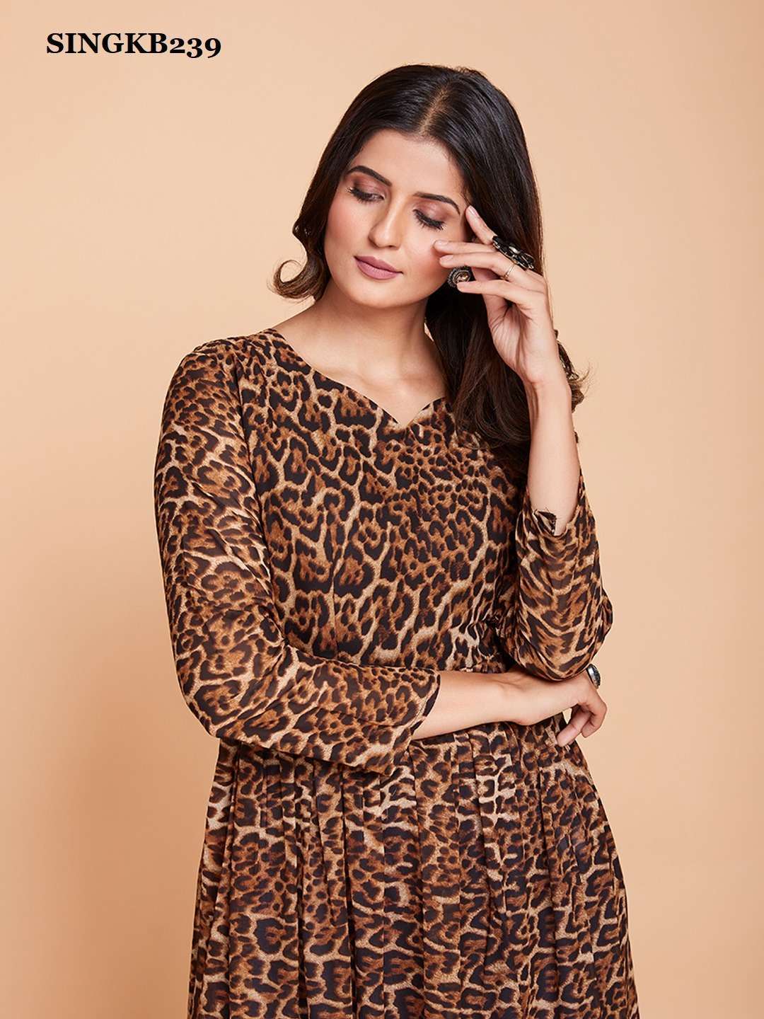 arya singkb239 fancy georgette brown color kurti