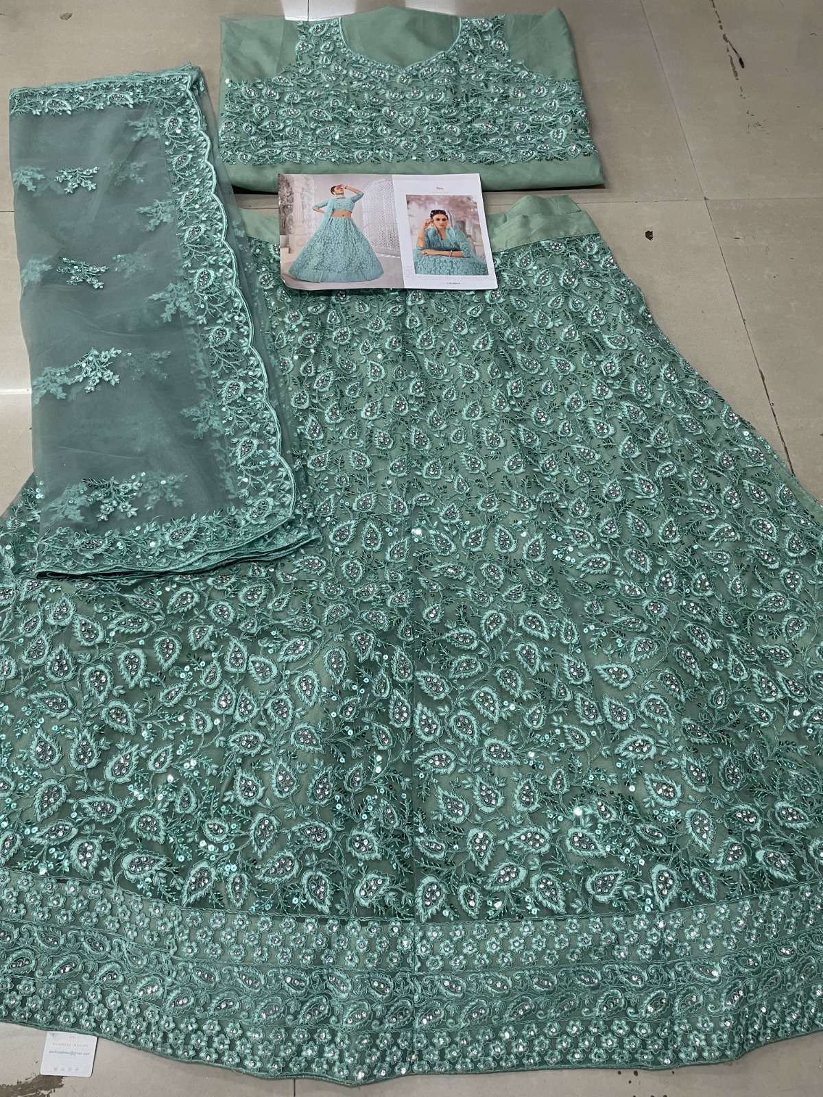 SENHORA designer Heavy Net With Fancy Dori Work lehenga
