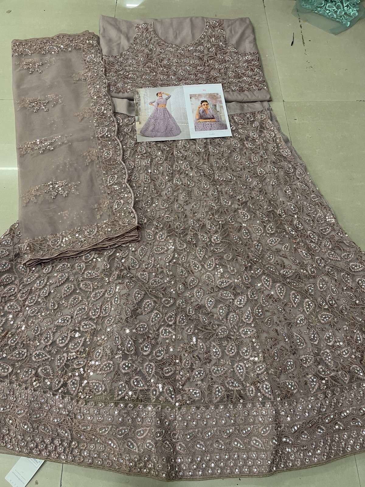 SENHORA designer Heavy Net With Fancy Dori Work lehenga
