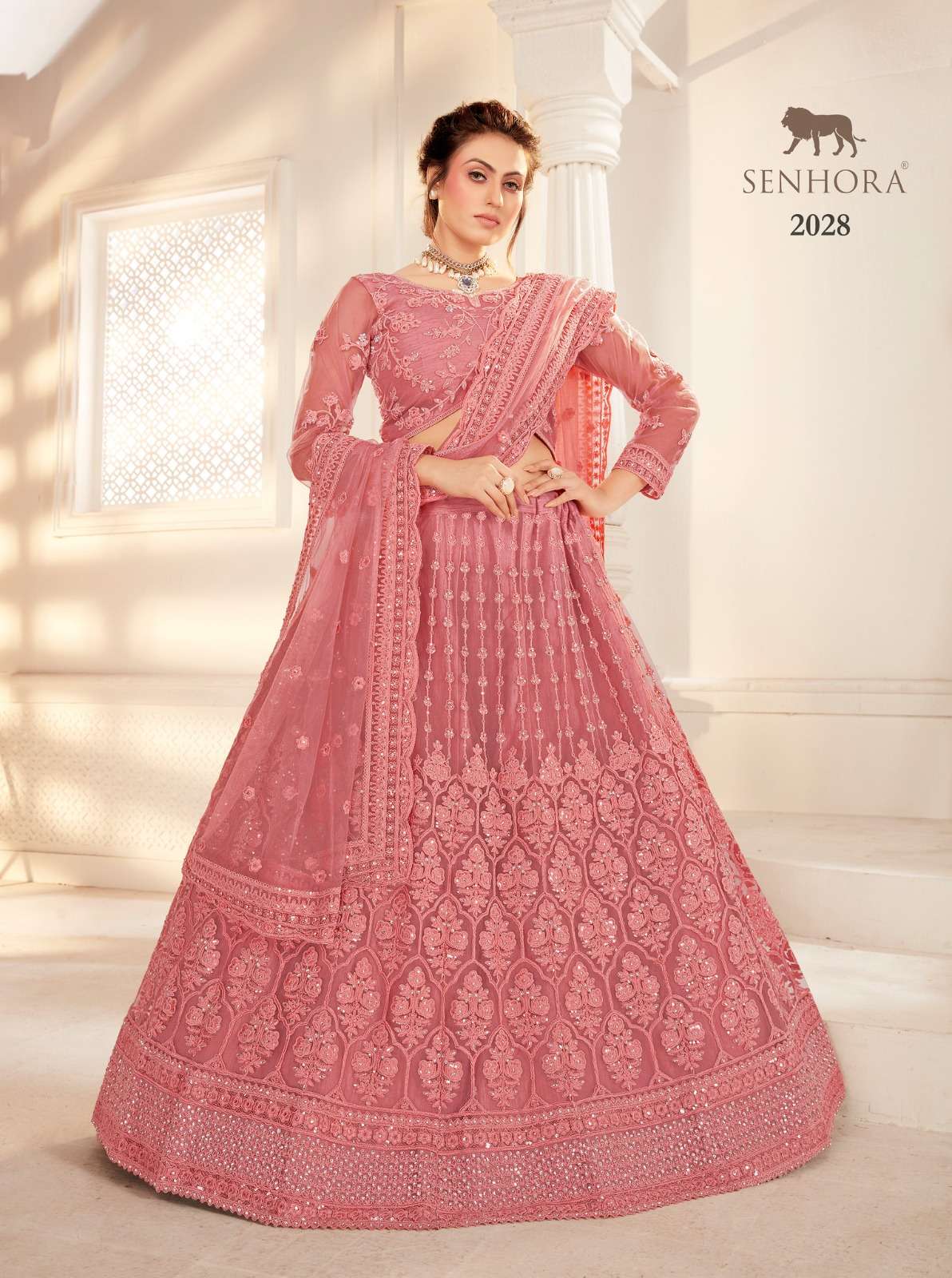 SENHORA designer Heavy Net With Fancy Dori Work lehenga