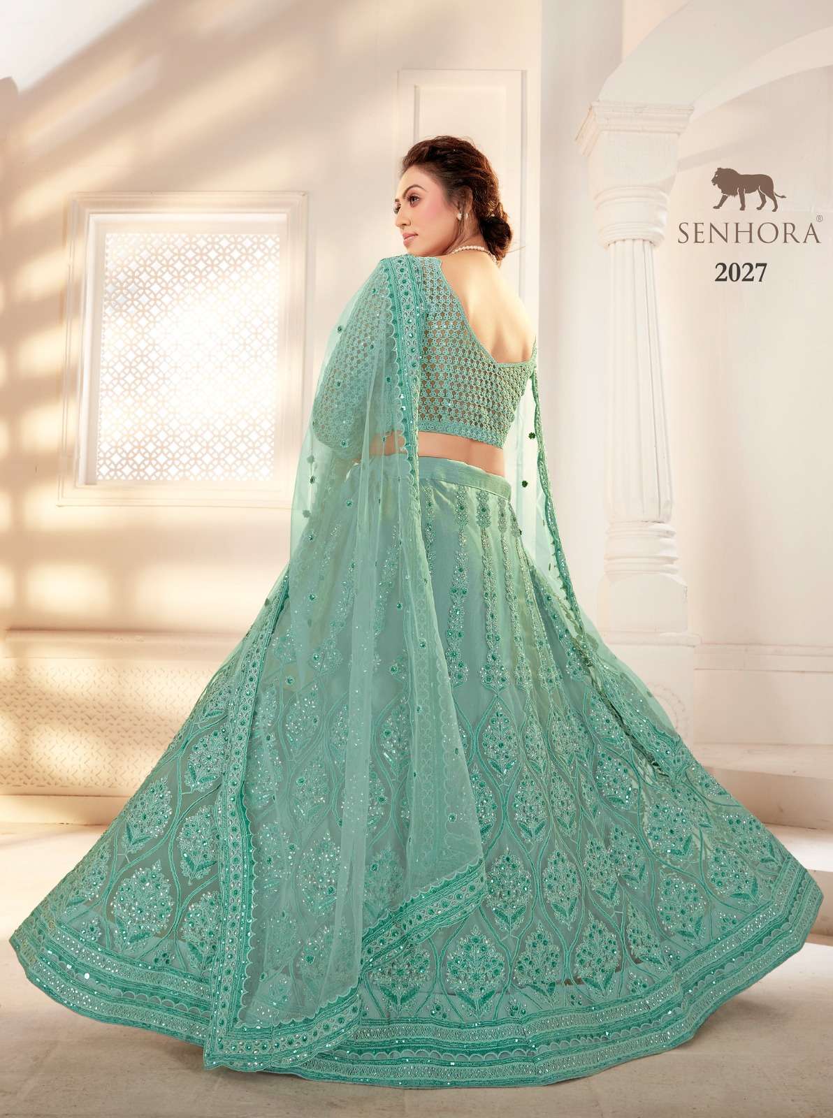 SENHORA designer Heavy Net With Fancy Dori Work lehenga