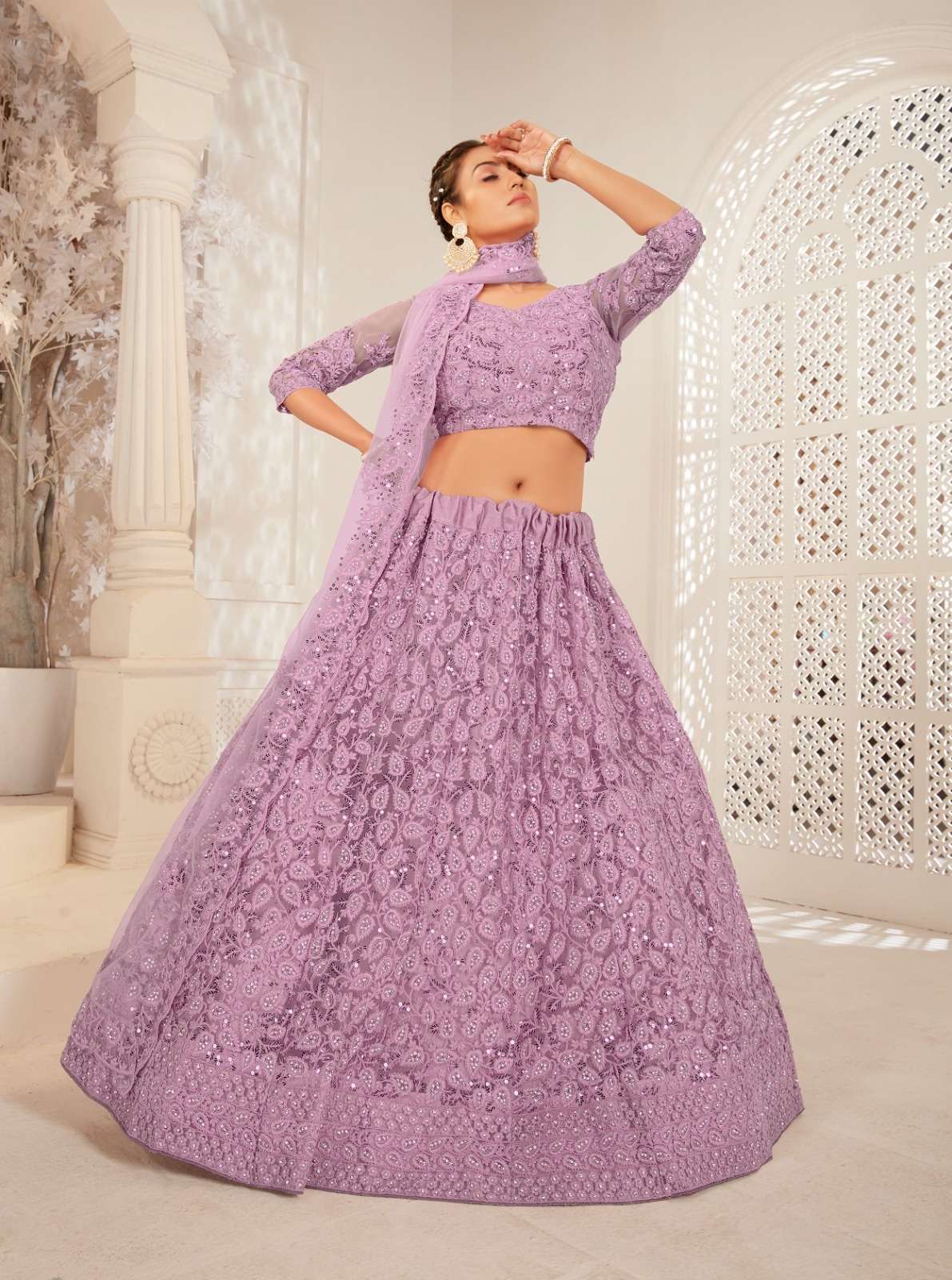 SENHORA designer Heavy Net With Fancy Dori Work lehenga