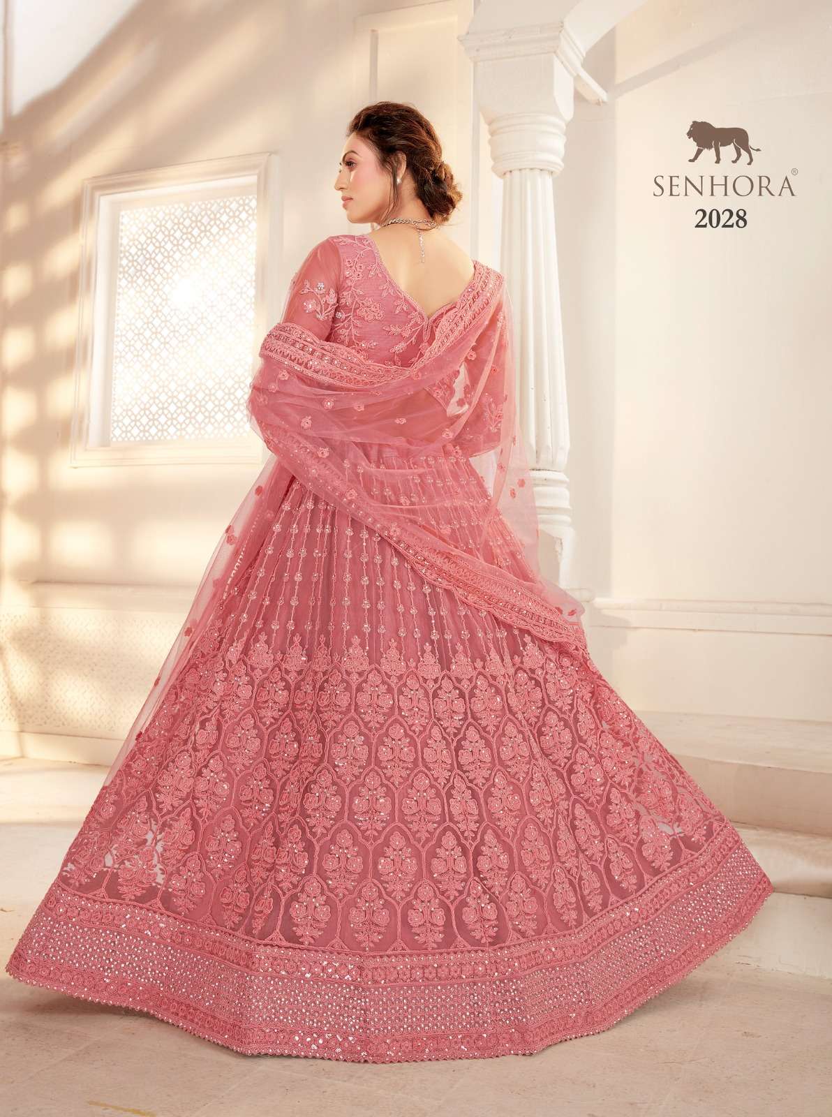 SENHORA designer Heavy Net With Fancy Dori Work lehenga