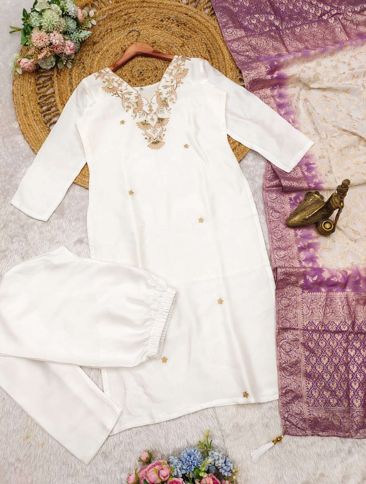  Flaunt the amazing WHITE Premium Roman Silk color of this suit 