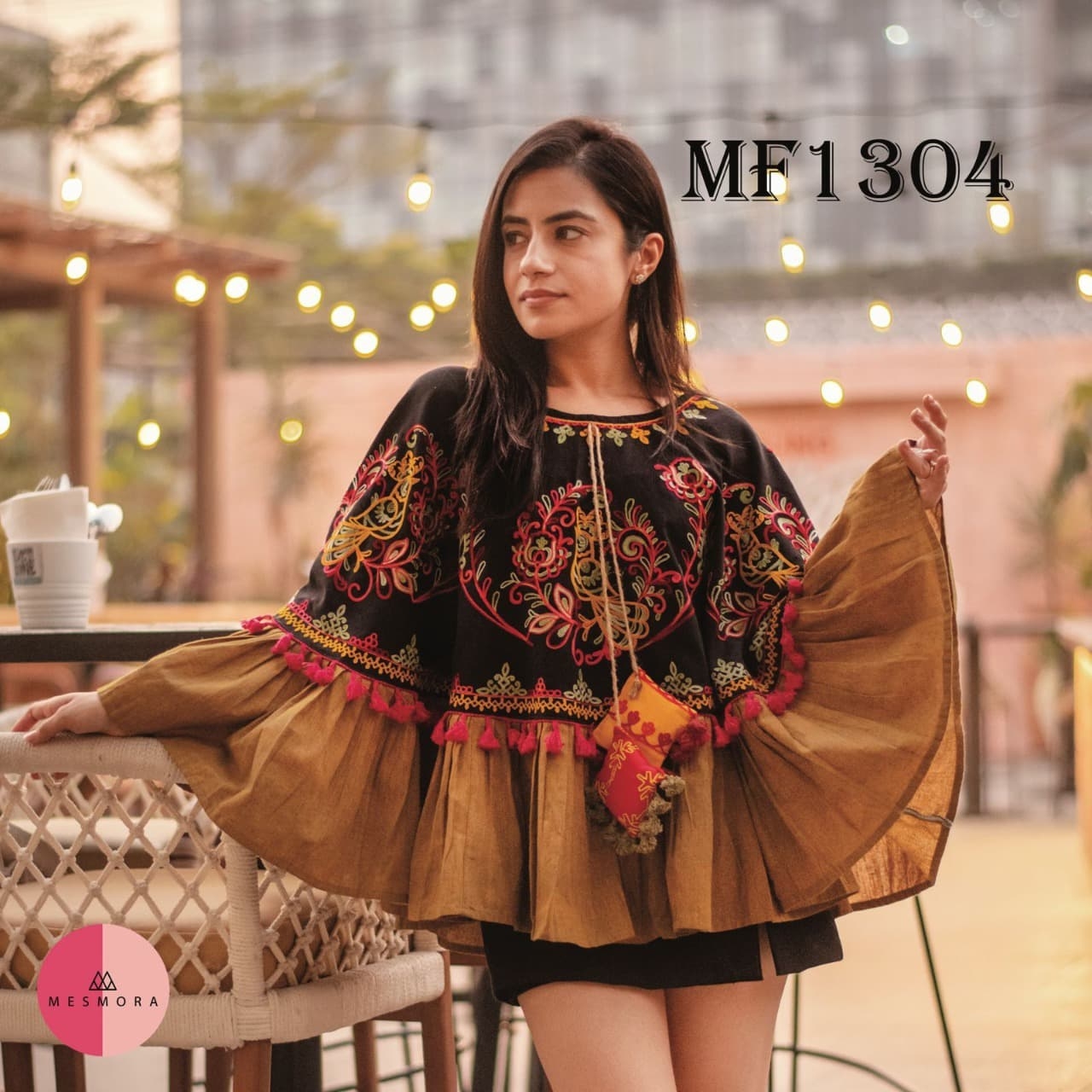 CIRCULAR PONCHO Minute woollen and jute embroidery decorated by Dazzling laces