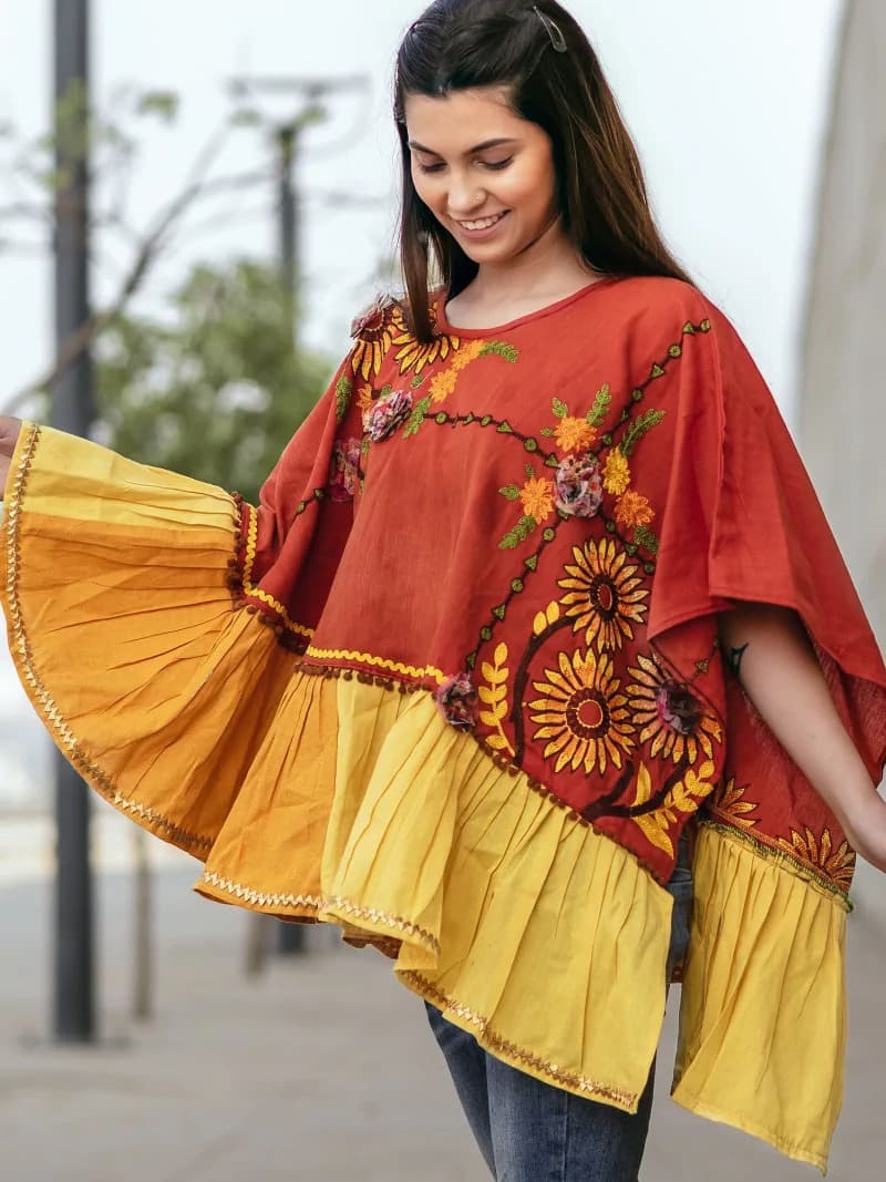 CIRCULAR PONCHO Minute woollen and jute embroidery decorated by Dazzling laces