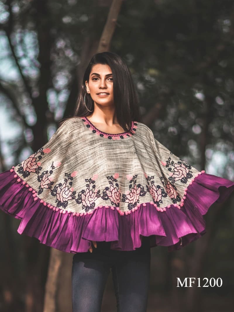 CIRCULAR PONCHO Minute woollen and jute embroidery decorated by Dazzling laces