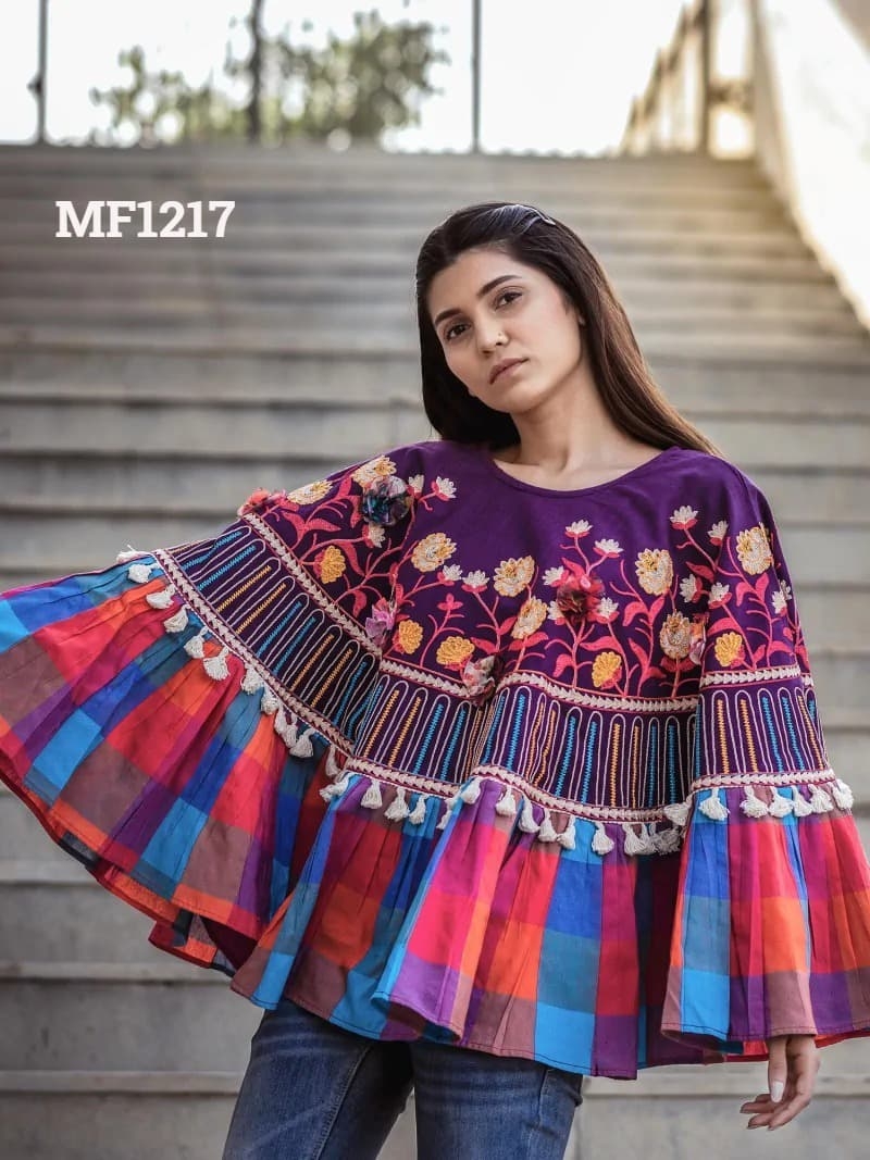 CIRCULAR PONCHO Minute woollen and jute embroidery decorated by Dazzling laces
