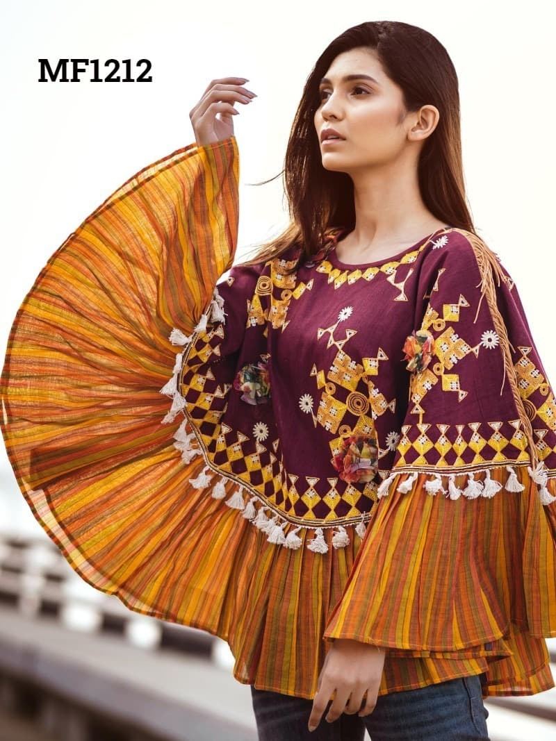 CIRCULAR PONCHO Minute woollen and jute embroidery decorated by Dazzling laces