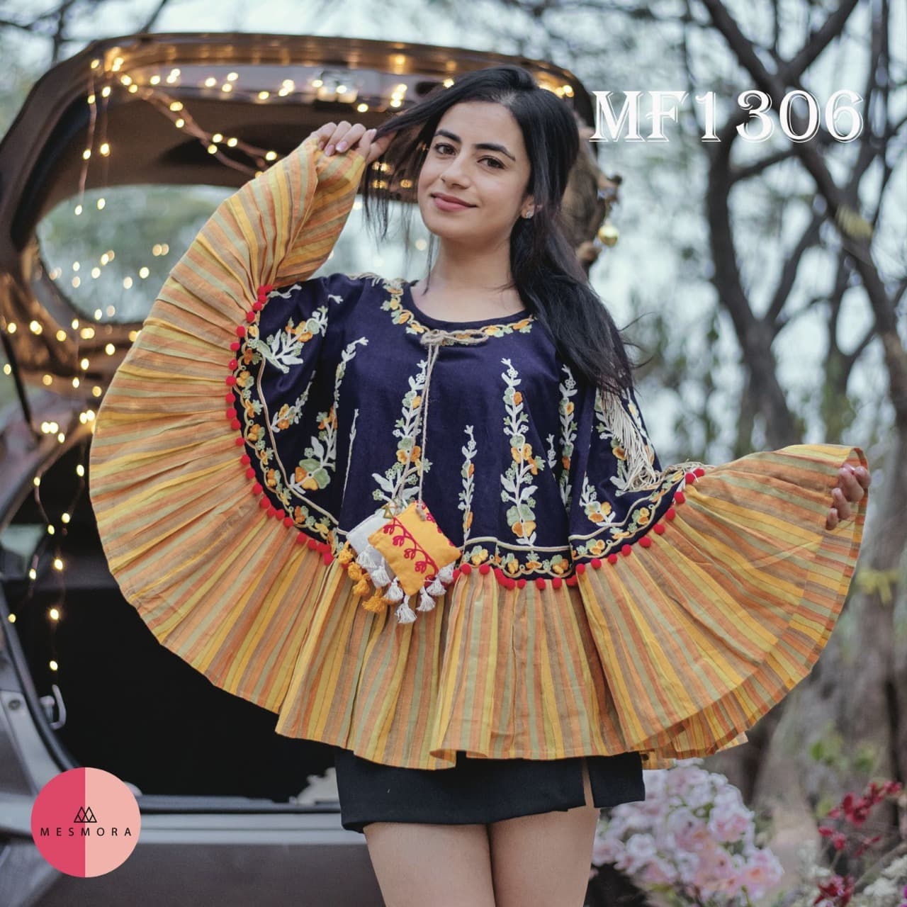 CIRCULAR PONCHO Minute woollen and jute embroidery decorated by Dazzling laces